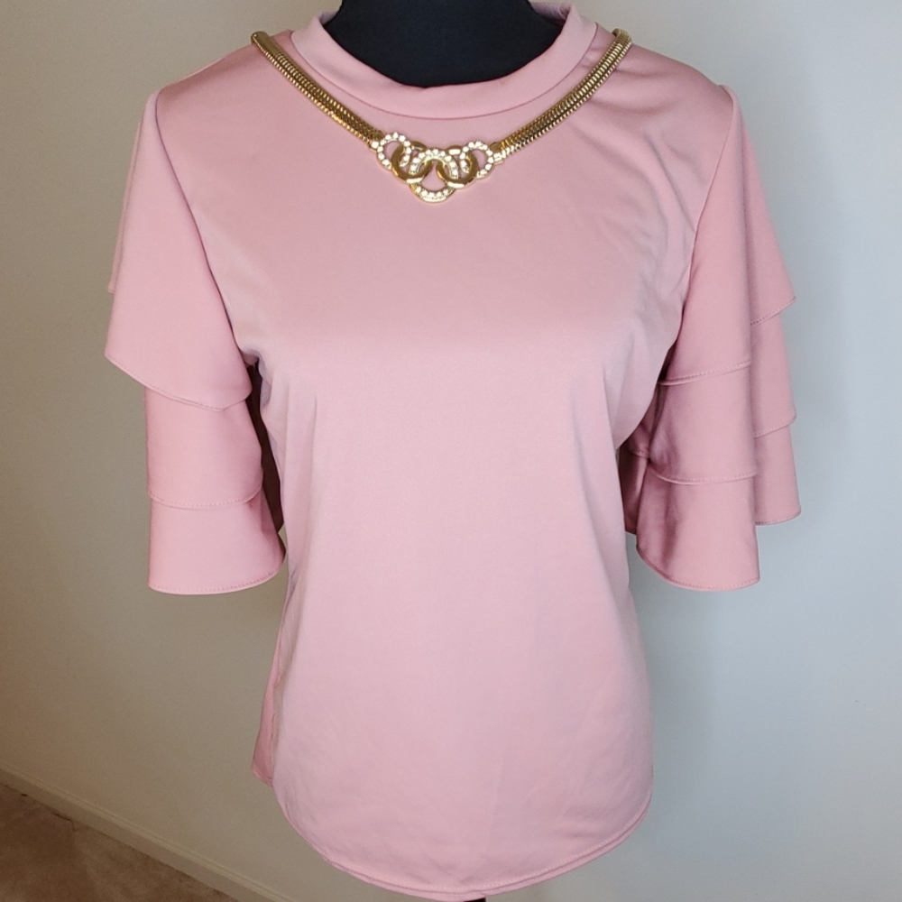 Pink top with ruffled sleeves